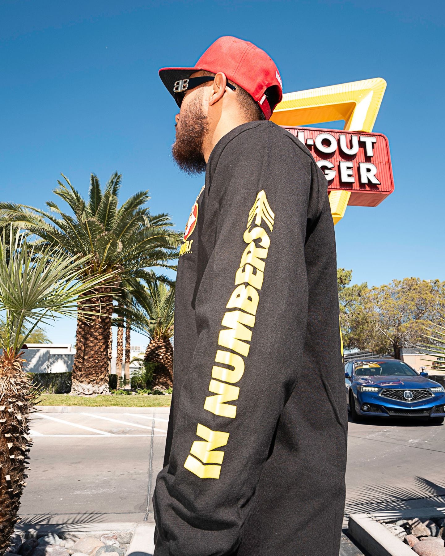 Power In Numbers L/S Tee - Black/Red/Yellow