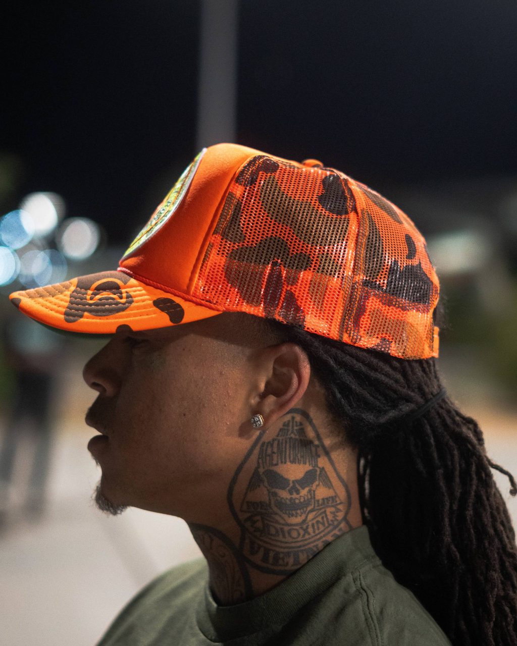 PATCHED UP CAMOFLAUGE ORANGE TRUCKER