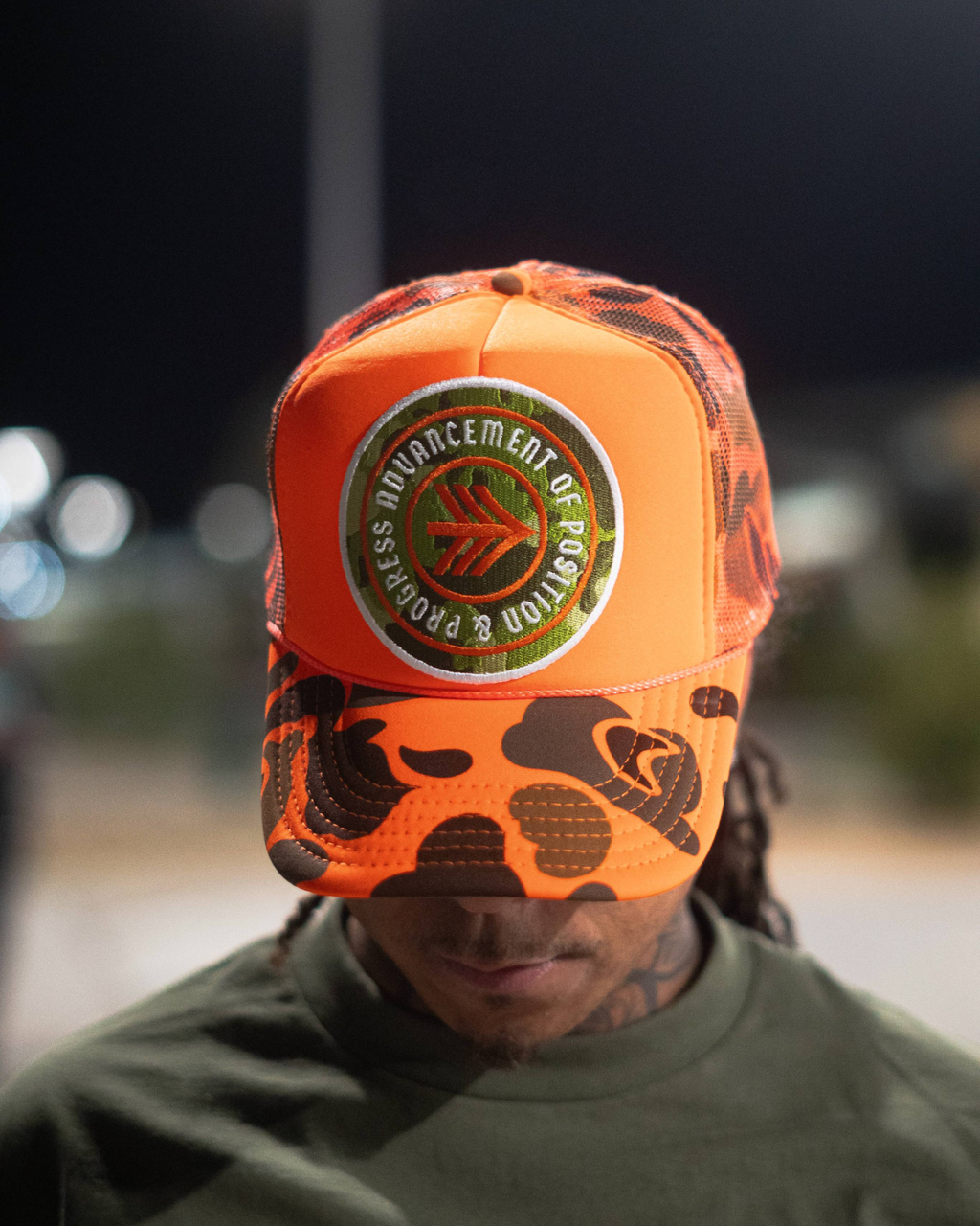 PATCHED UP CAMOFLAUGE ORANGE TRUCKER