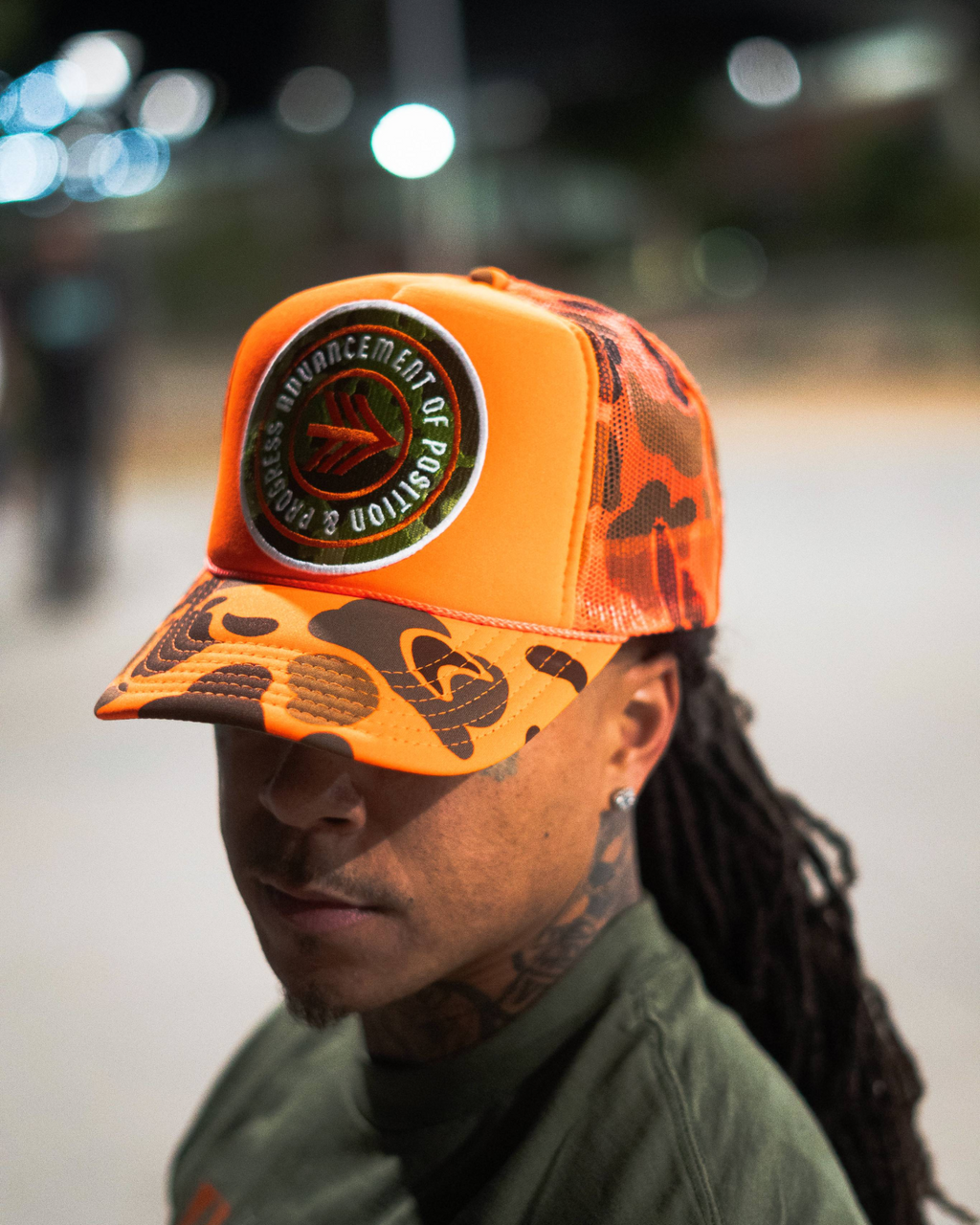 PATCHED UP CAMOFLAUGE ORANGE TRUCKER